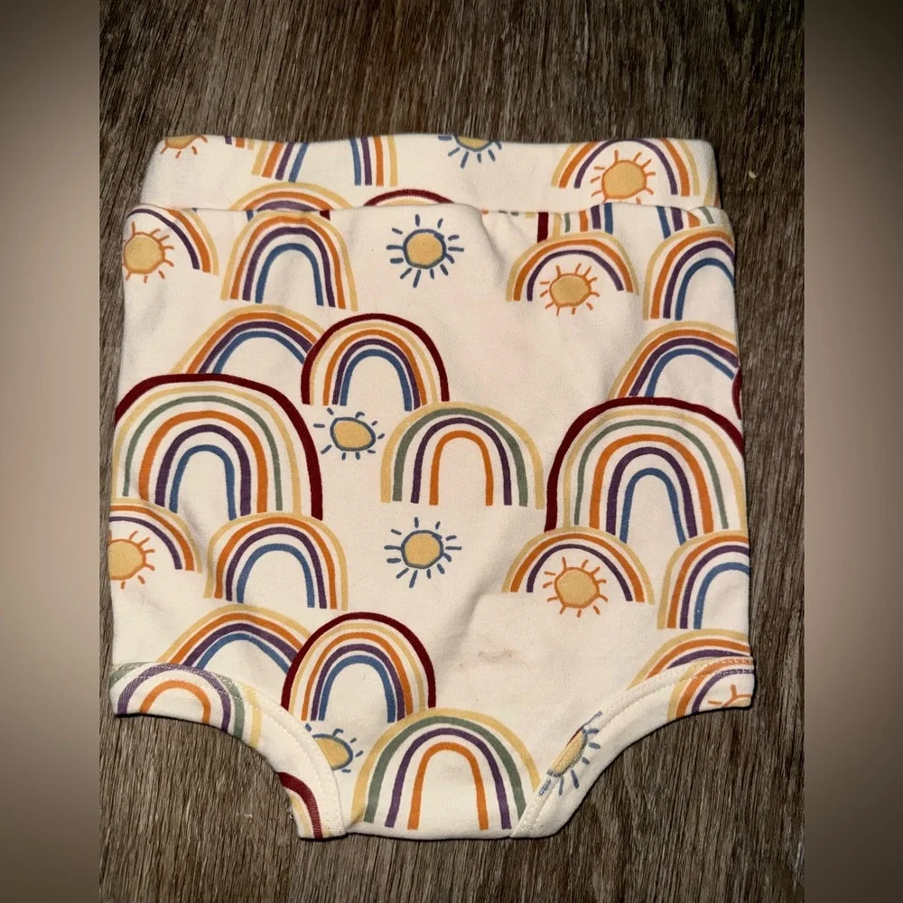 Kate Quinn rainbow and sunshine bummies